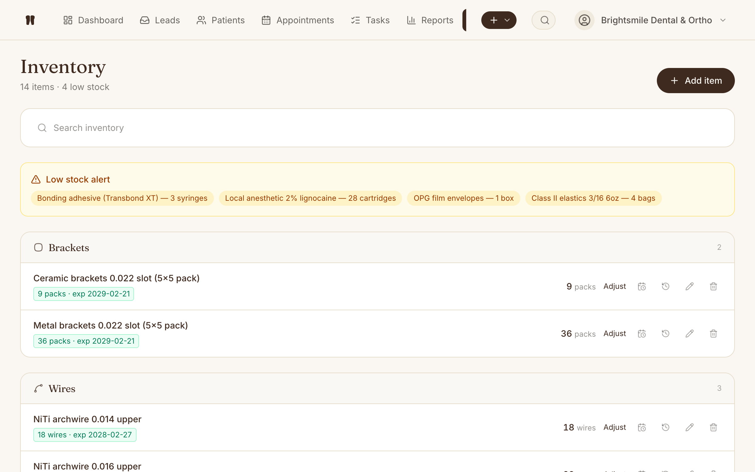 Crownly inventory with per-specialty categories, stock levels, and low-stock alerts